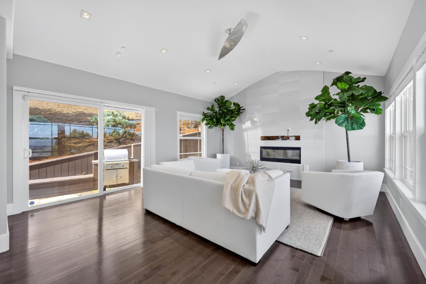 58 Hillcrest Road San Carlos, CA 94070 - Photo 15 of 105 a living room with furniture a potted plant and a large window