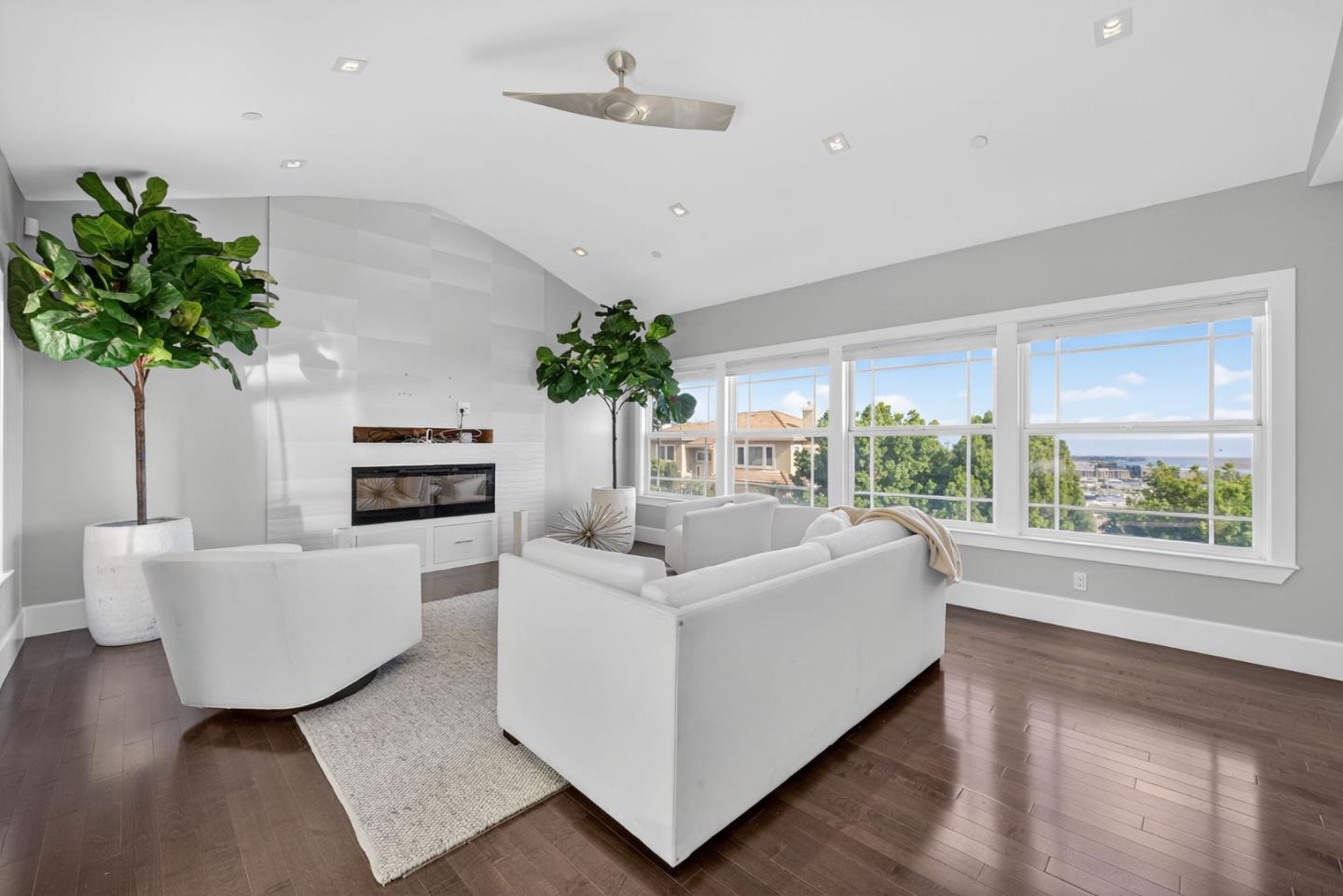 58 Hillcrest Road San Carlos, CA 94070 - Photo 16 of 105 a living room with furniture a potted plant and a large window