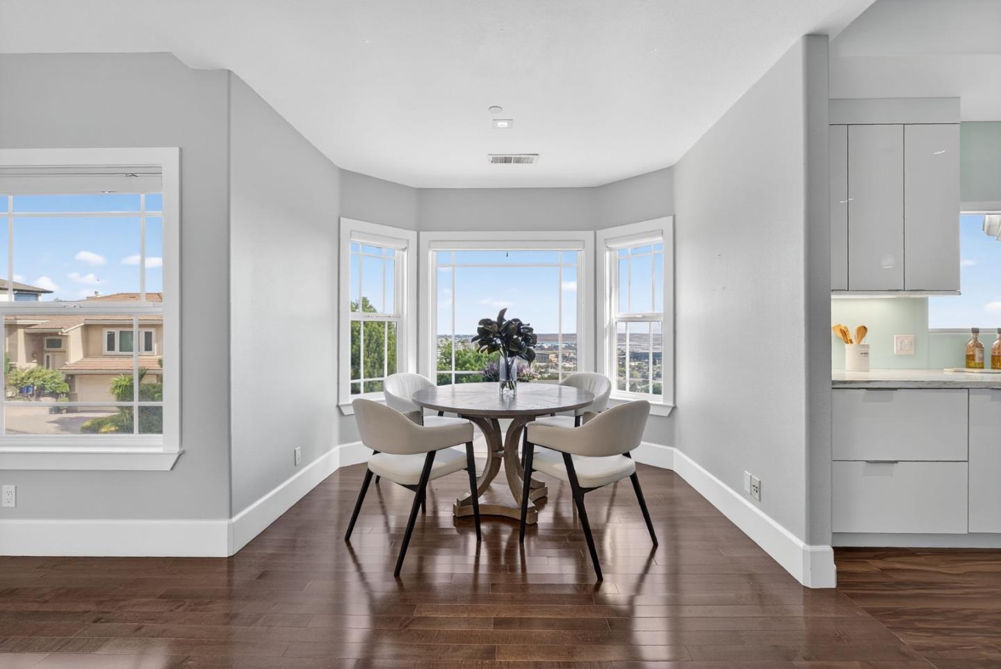 58 Hillcrest Road San Carlos, CA 94070 - Photo 19 of 105 a view of a dining room with furniture and wooden floor