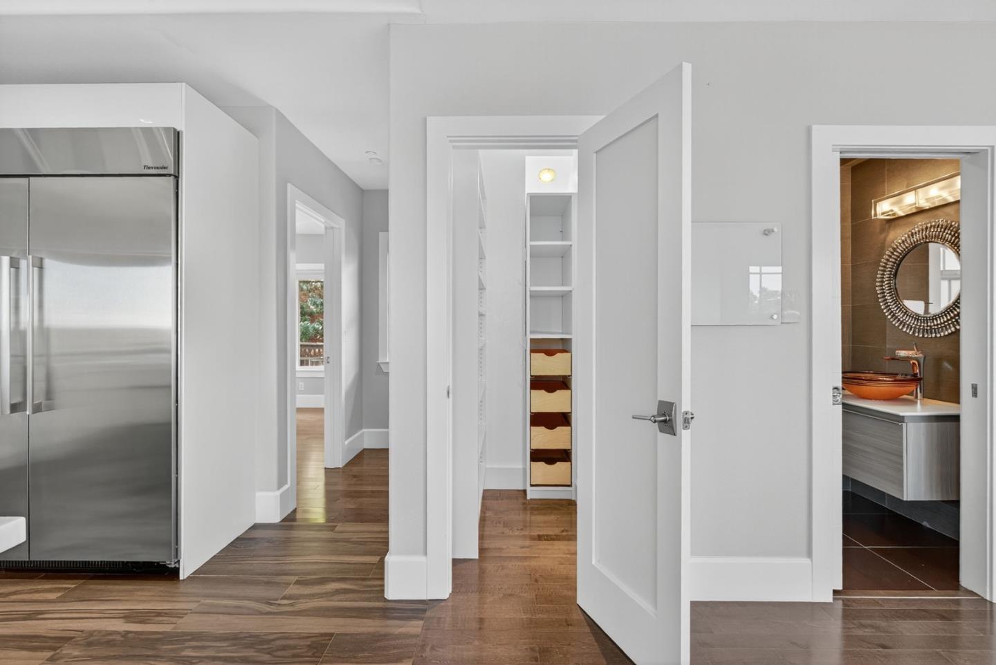 58 Hillcrest Road San Carlos, CA 94070 - Photo 32 of 105 a view of a hallway with wooden floor and closet
