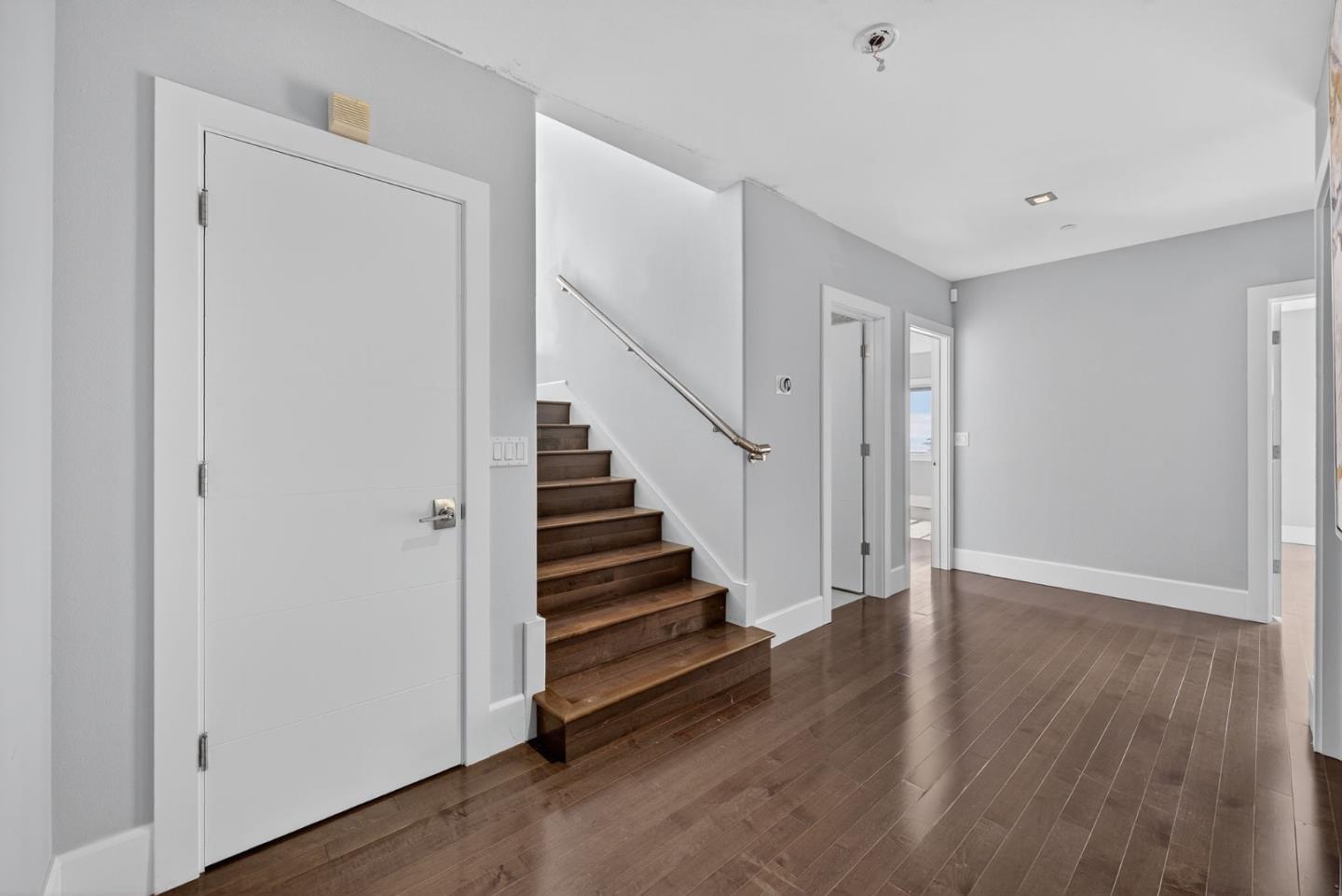58 Hillcrest Road San Carlos, CA 94070 - Photo 34 of 105 a view of a hallway with wooden floor and entryway