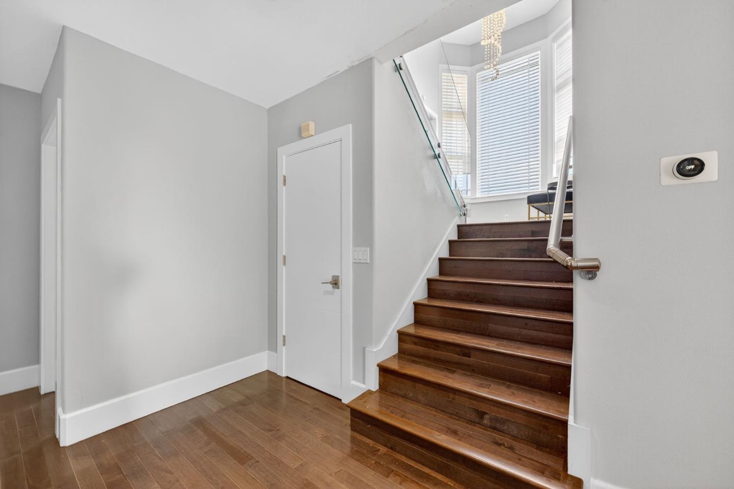 58 Hillcrest Road San Carlos, CA 94070 - Photo 86 of 105 a view of staircase with wooden floor and white walls