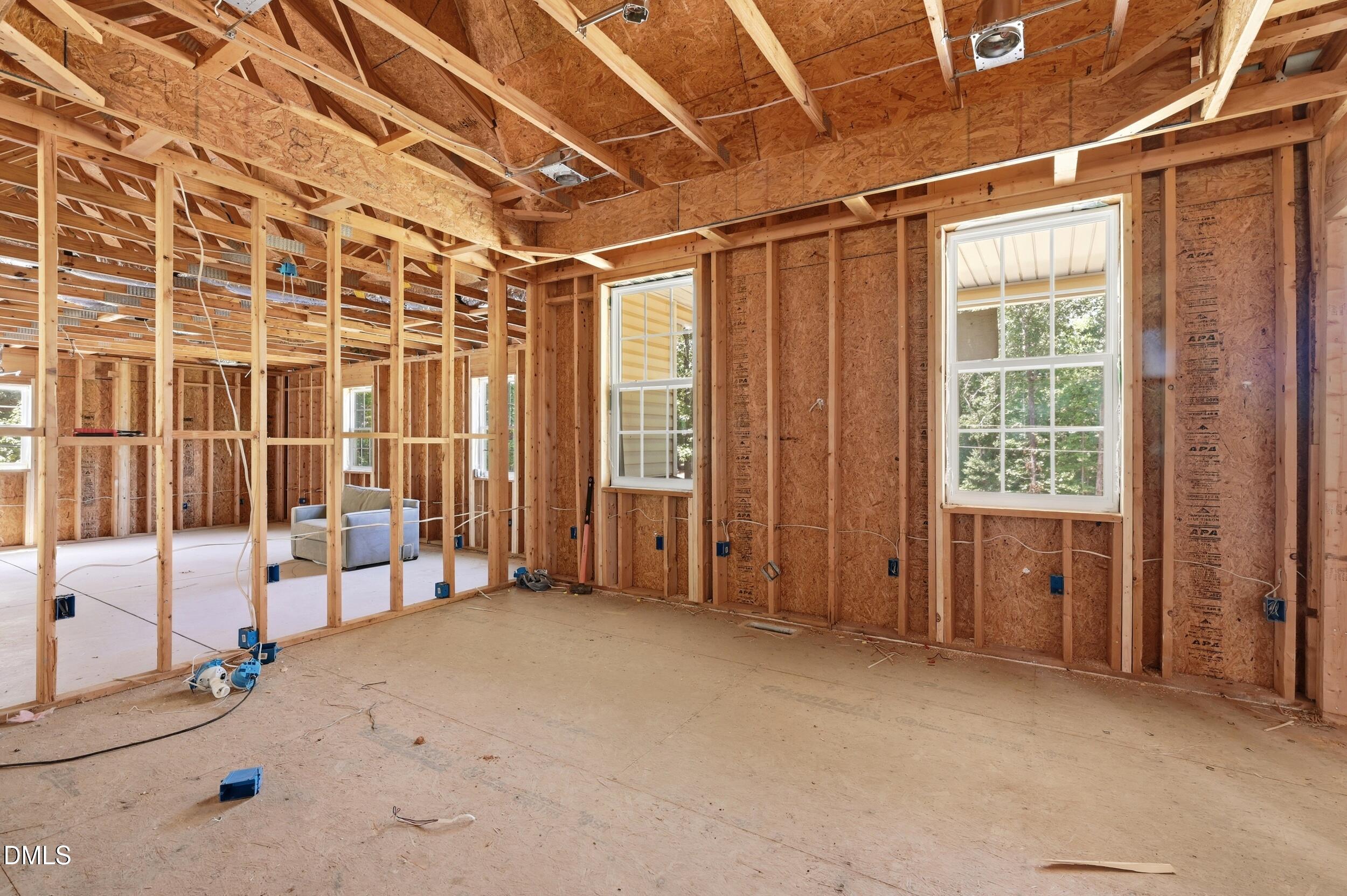 129 Shaman Drive Spring Hope, NC 27882 - Photo 18 of 43 a view of an empty room with glass door