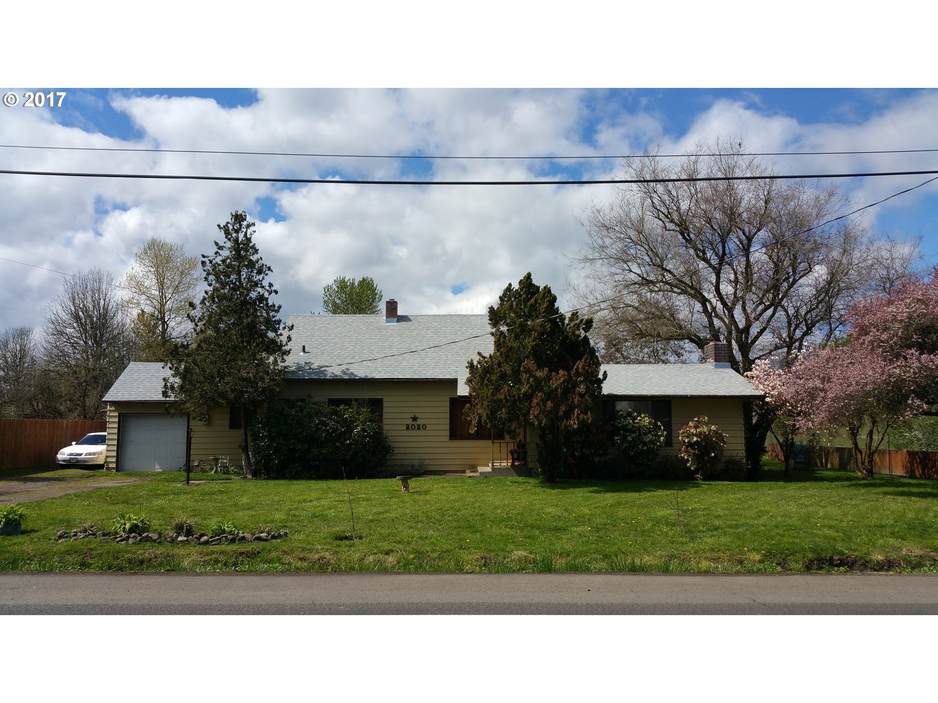 2020 Southwest 53rd Street Corvallis, OR 97333 - Photo 1 of 8 a black and white photo of a house