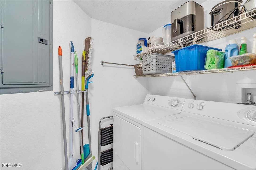 4109 Residence Drive, Unit 510 Fort Myers, FL 33901 - Photo 24 of 35 a utility room with dryer and washer