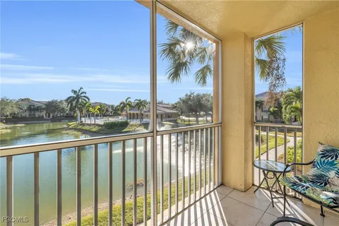 a view of a balcony with furniture
