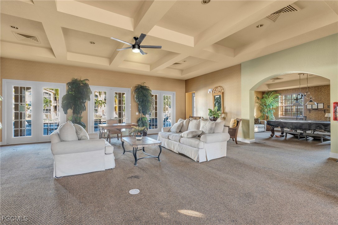 4109 Residence Drive, Unit 510 Fort Myers, FL 33901 - Photo 30 of 35 a living room with furniture and a large window