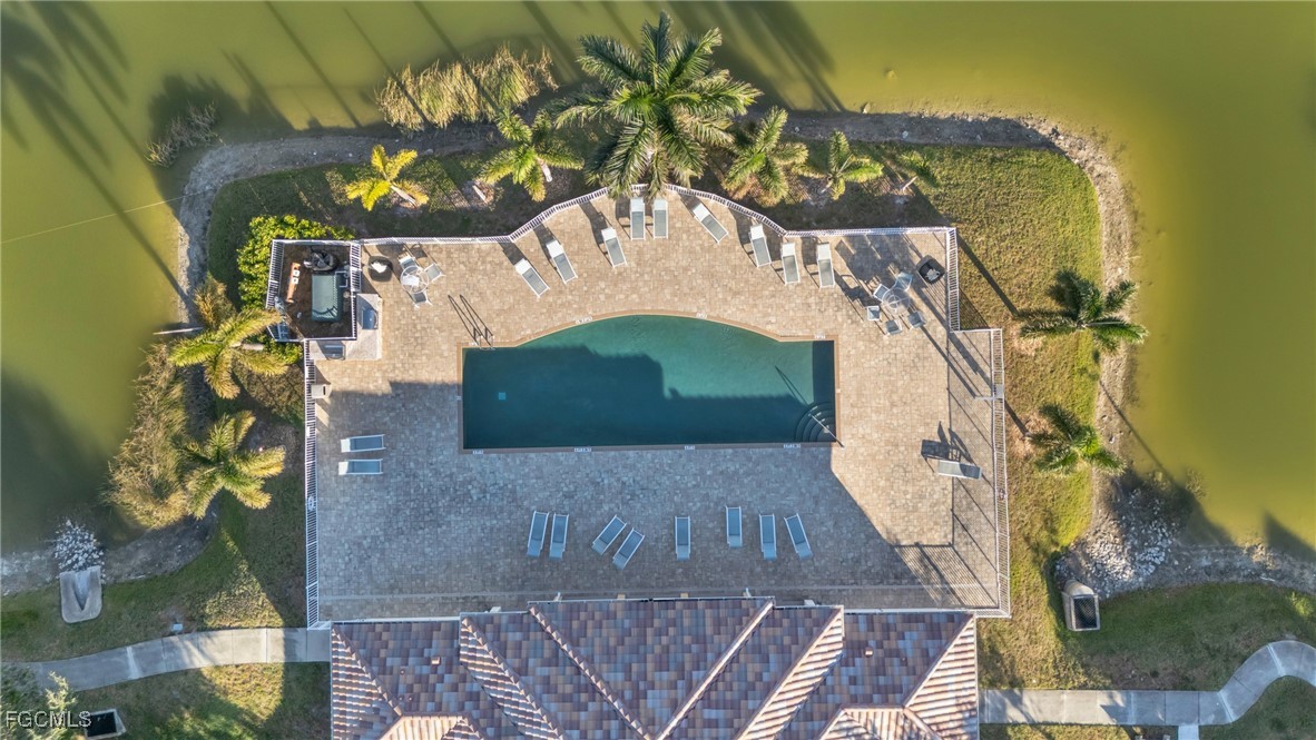 4109 Residence Drive, Unit 510 Fort Myers, FL 33901 - Photo 33 of 35 a picture of a table with wooden floor