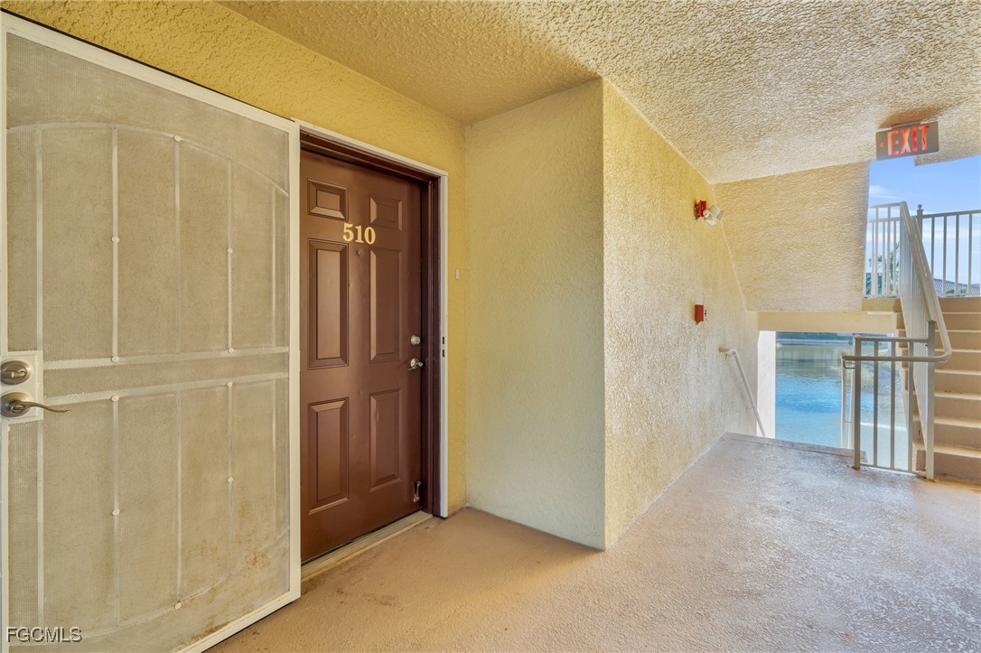 4109 Residence Drive, Unit 510 Fort Myers, FL 33901 - Photo 4 of 35 an empty room with windows