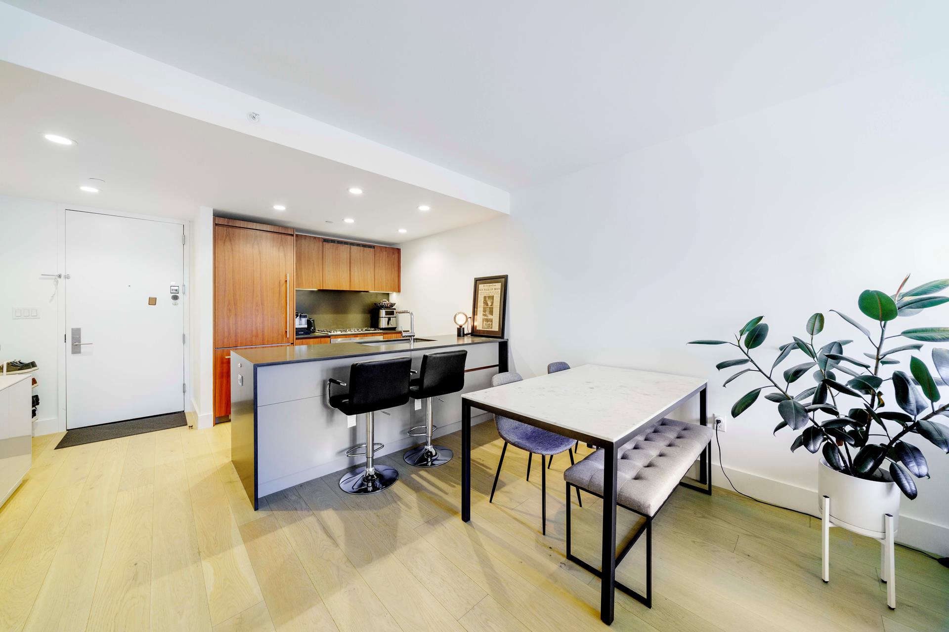 575 4th Avenue, Unit 2G Brooklyn, NY 11215 - Photo 7 of 7 a view of a livingroom with furniture and a kitchen