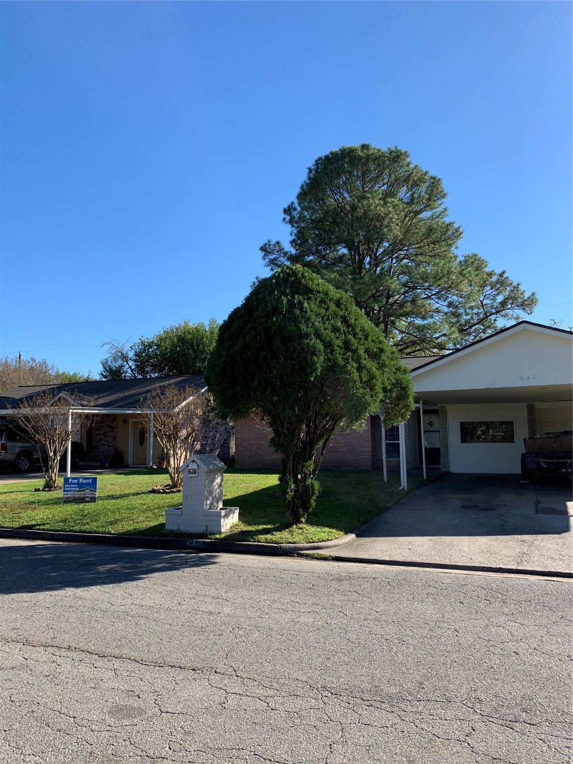 538 Glenvale Drive, Unit B Houston, TX 77060 - Photo 2 of 18 a front view of a house with a yard and garage