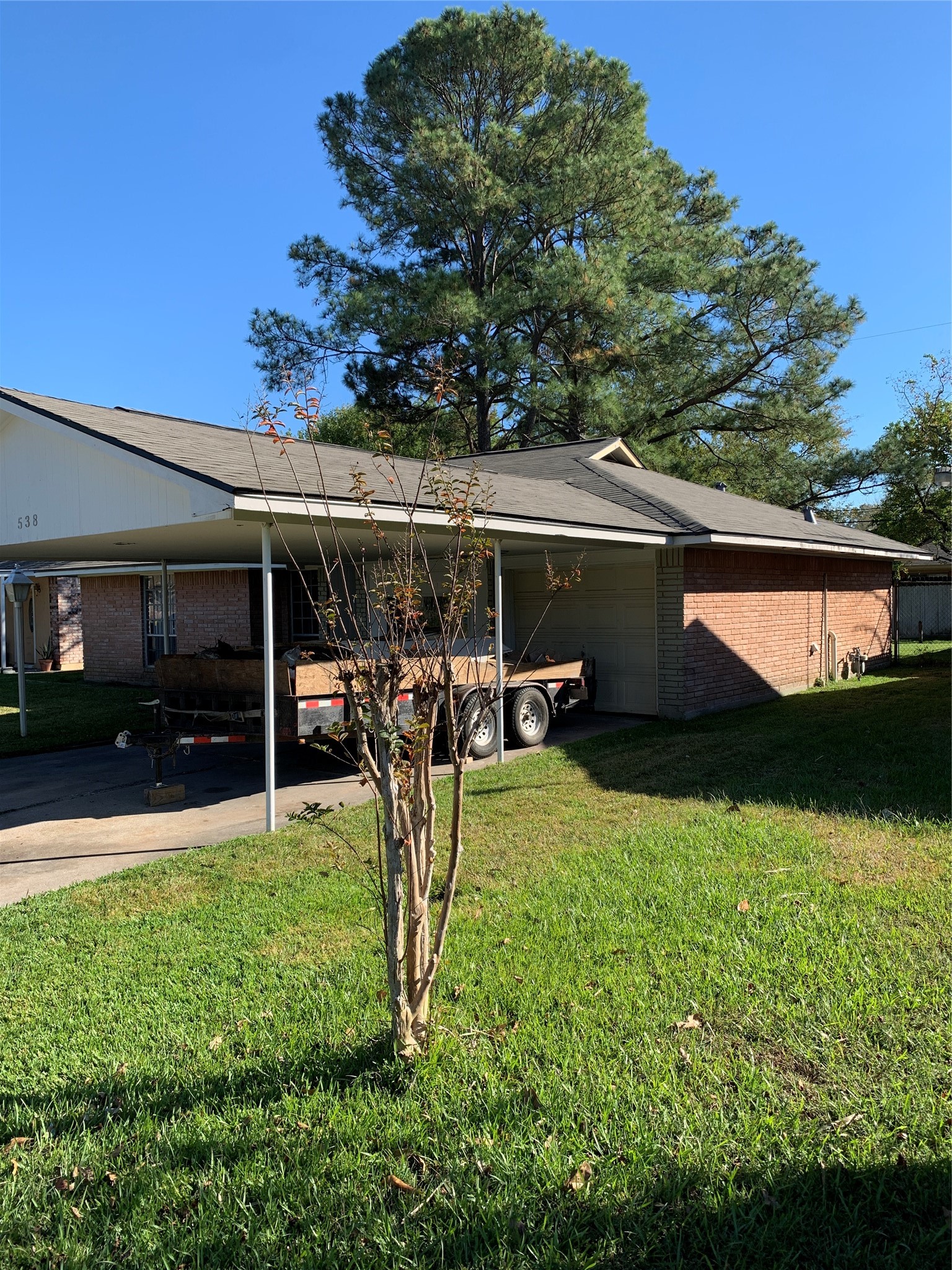 538 Glenvale Drive, Unit B Houston, TX 77060 - Photo 2 of 16 a view of a backyard house with a patio