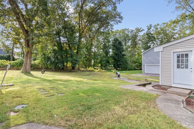 a view of a swimming pool with an outdoor space