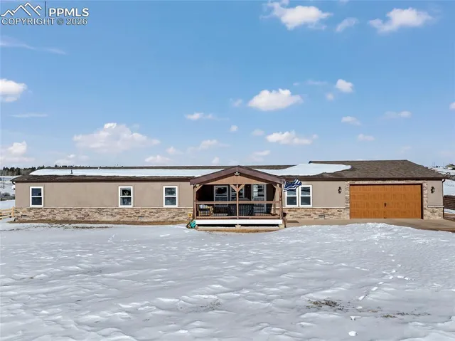 a front view of house with yard