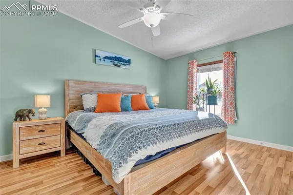a view of room with wooden floor