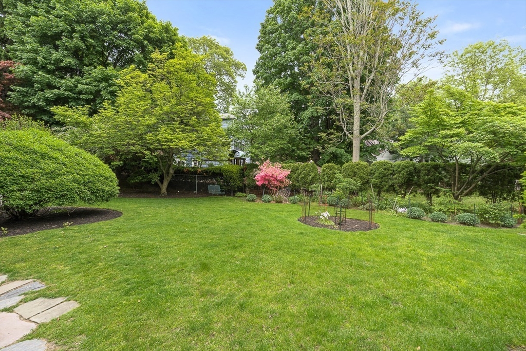 30 Rangeley Road Winchester, MA 01890 - Photo 34 of 42 a backyard of a house with lots of green space