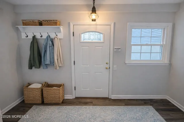 a view of livingroom with furniture and window