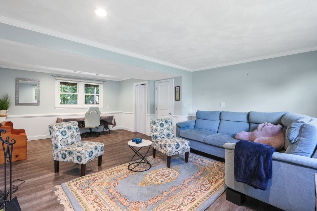 8 Given Drive Burlington, MA 01803 - Photo 23 of 42 a living room with furniture and a couch