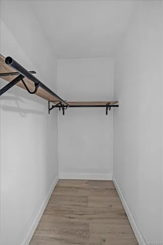 a view of a room with racks on the wall