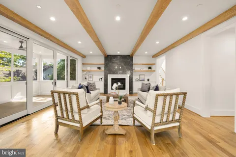 a bedroom with a bed and a table in it