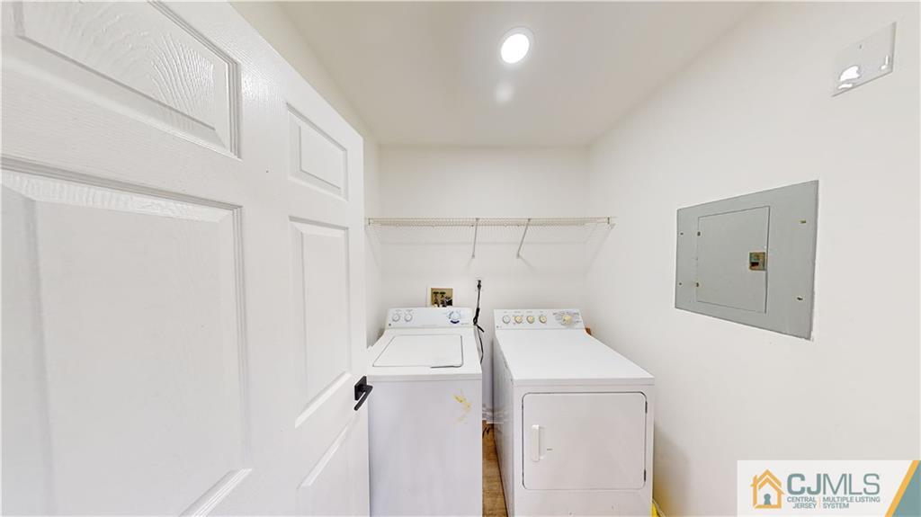 2405 Timber Ridge Court, Unit 2405 Sayreville, NJ 08859 - Photo 11 of 29 a utility room with dryer and washer