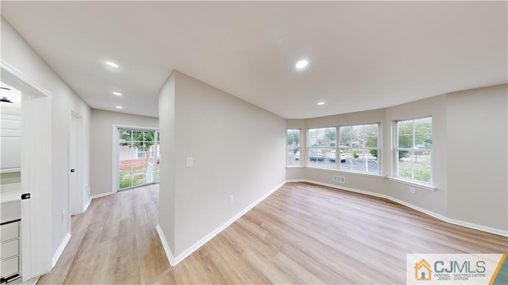 2405 Timber Ridge Court, Unit 2405 Sayreville, NJ 08859 - Photo 4 of 29 a view of livingroom with hardwood