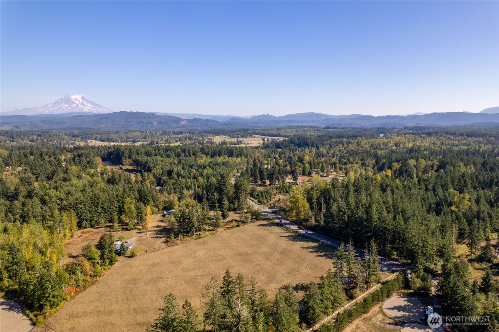 36716 Eatonville Cutoff Road East Eatonville, WA 98328 - Photo 28 of 37 a view of a town with mountains in the background