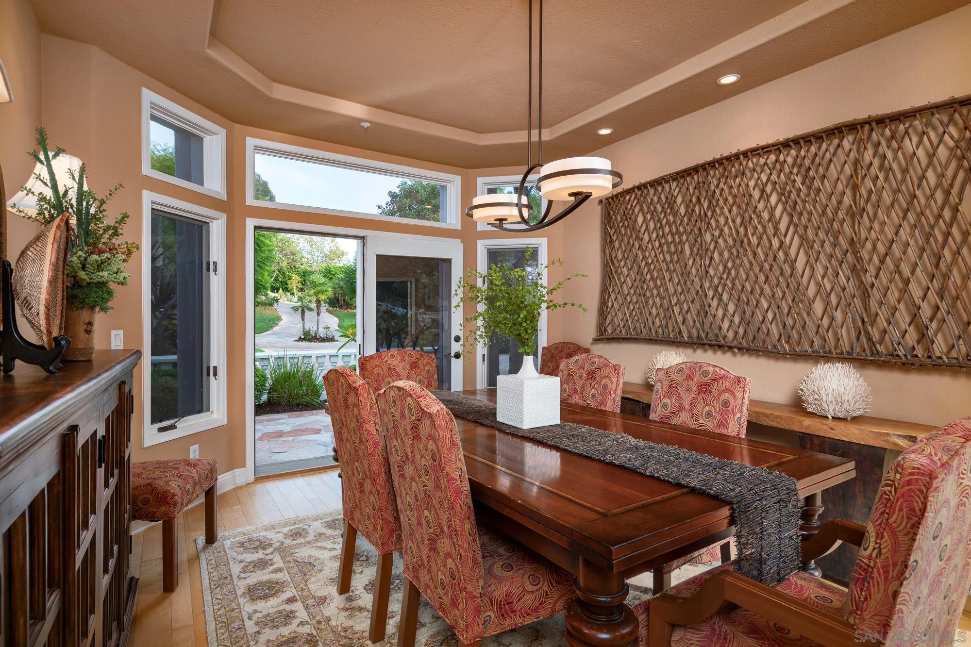 3397 Rocking Horse Circle Encinitas, CA 92024 - Photo 11 of 33 a dining room with furniture a chandelier and window