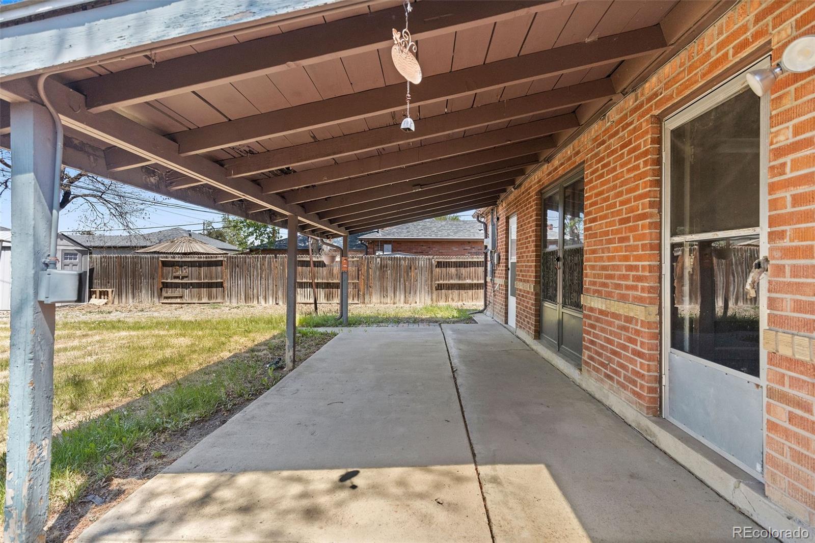 1283 Racine Street Aurora, CO 80011 - Photo 21 of 25 a view of a porch