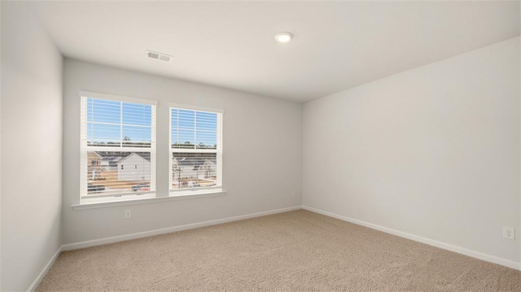 1908 Endress Circle Hampton, GA 30228 - Photo 22 of 35 an empty room with a window