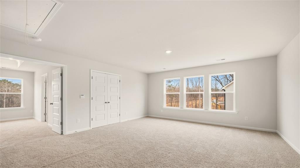1908 Endress Circle Hampton, GA 30228 - Photo 25 of 35 an empty room with windows