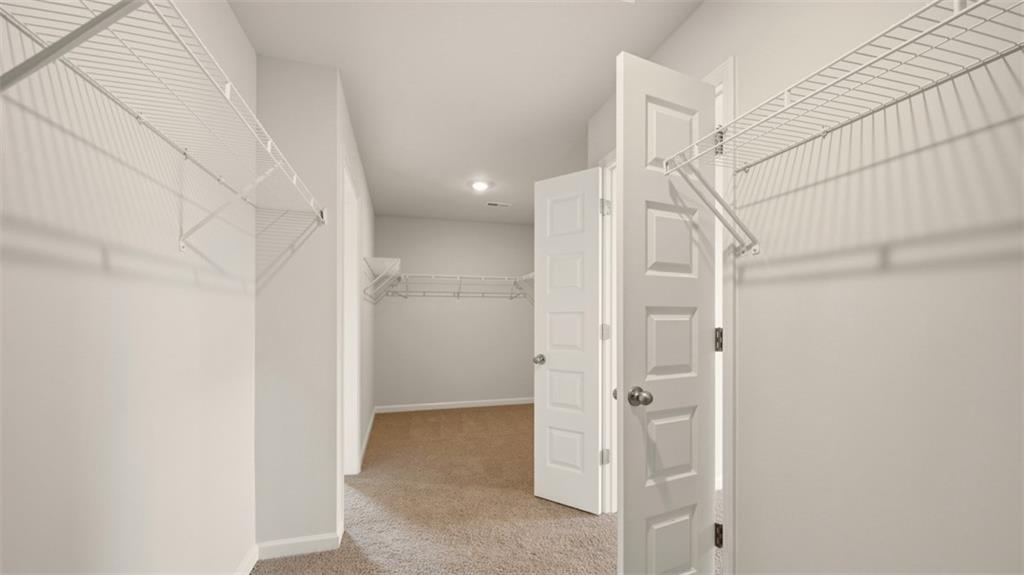 1908 Endress Circle Hampton, GA 30228 - Photo 28 of 35 a bathroom with a shower and a glass door