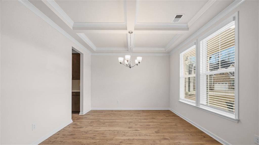 1908 Endress Circle Hampton, GA 30228 - Photo 5 of 35 a view of a livingroom with a ceiling fan and window
