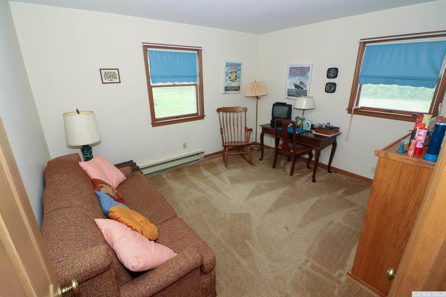 33 Viewmont Road Copake, NY 12516 - Photo 16 of 26 a living room with furniture and a window