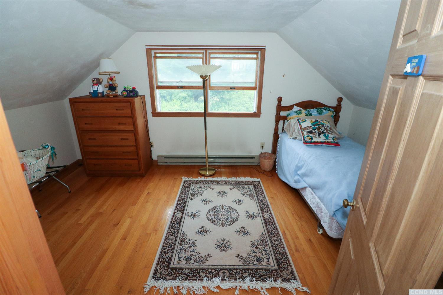 33 Viewmont Road Copake, NY 12516 - Photo 25 of 26 a living room with furniture and a gate