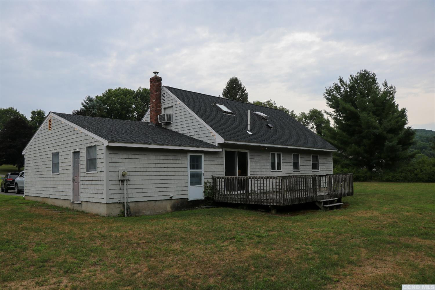 33 Viewmont Road Copake, NY 12516 - Photo 4 of 26 a front view of a house with a garden