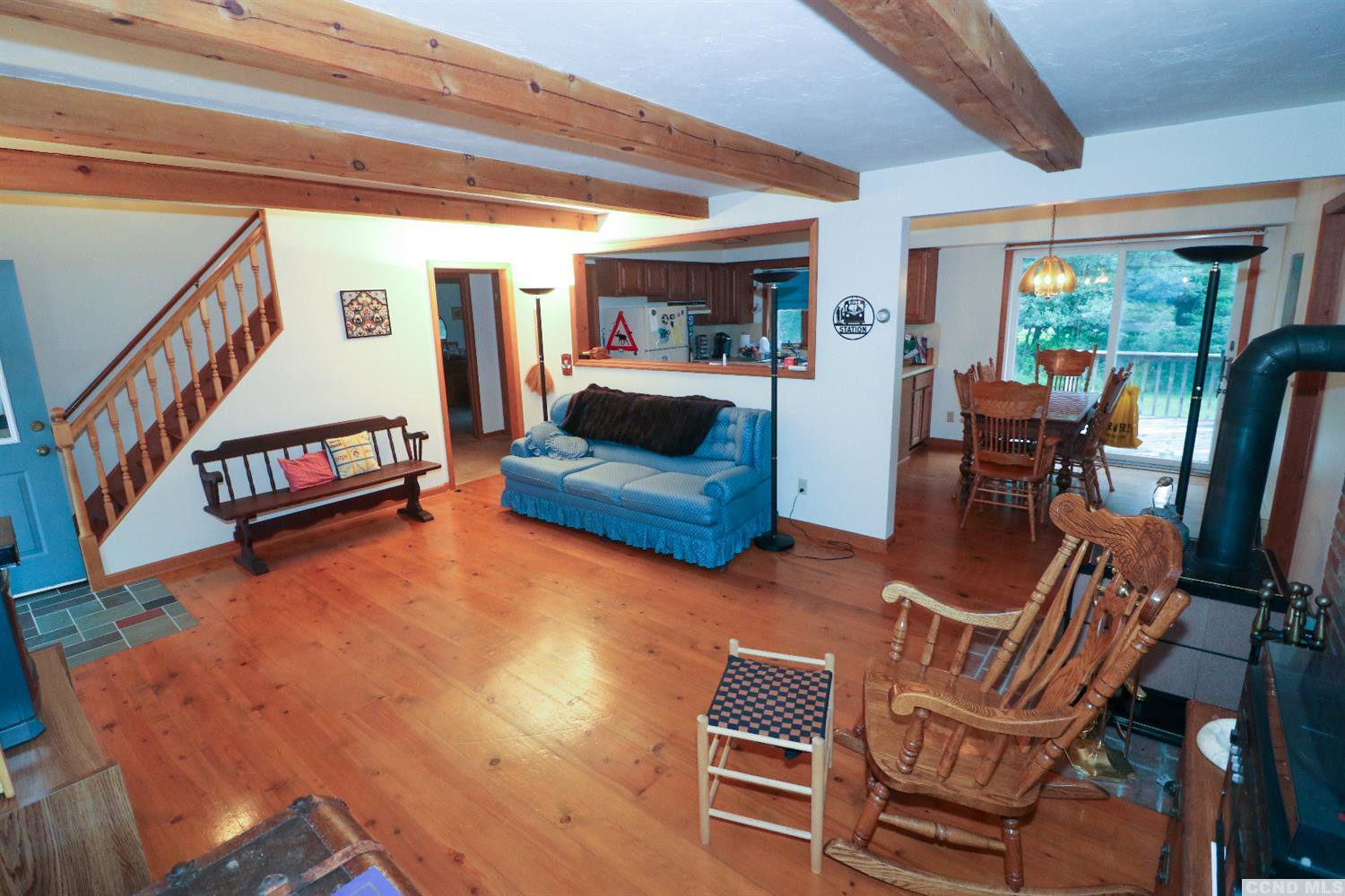 33 Viewmont Road Copake, NY 12516 - Photo 6 of 26 a living room with furniture and a flat screen tv