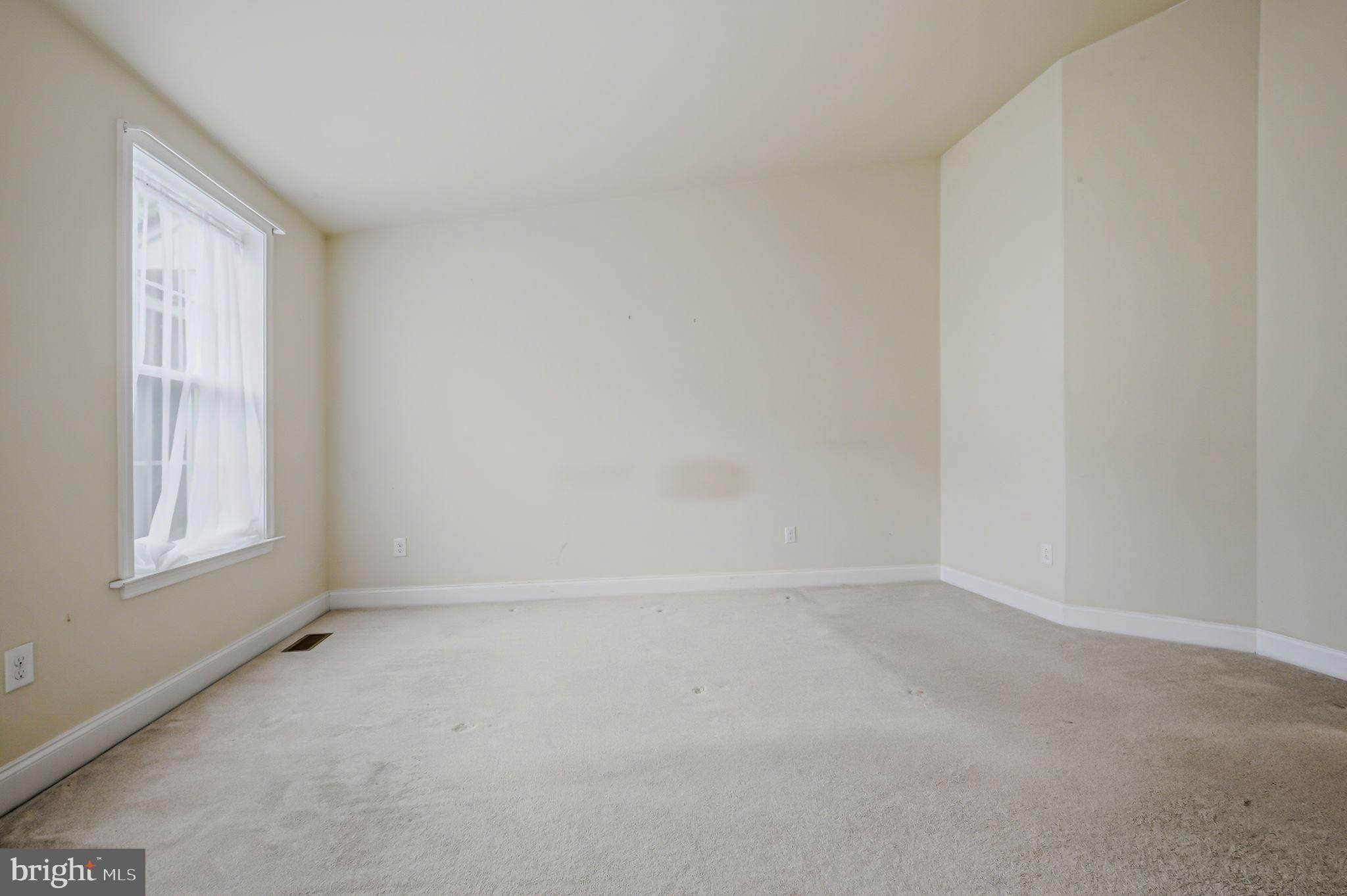 208 Jackdaw Alley, Unit 208 Springfield, PA 19064 - Photo 42 of 49 a view of an empty room with a window