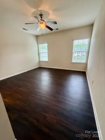 a bathroom with a sink double vanity and a mirror