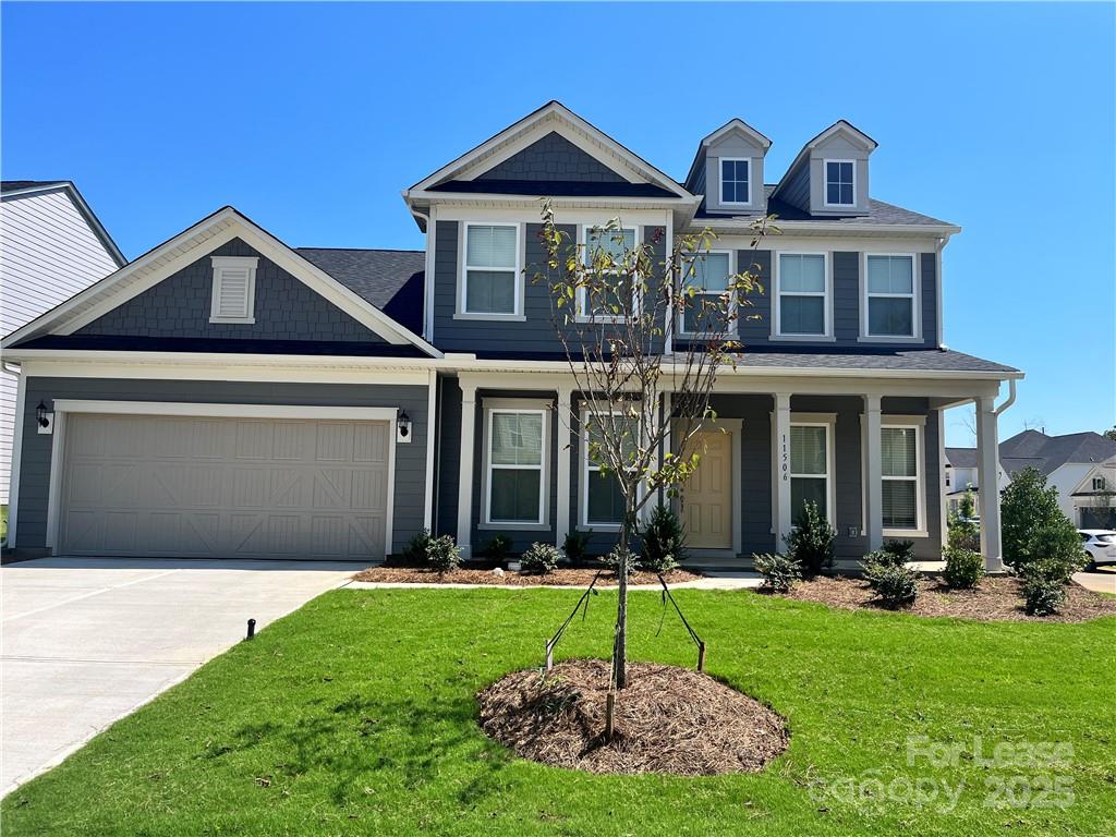 11506 Oakhampton Way Matthews, NC 28105 - Photo 2 of 27 a front view of a house with a yard