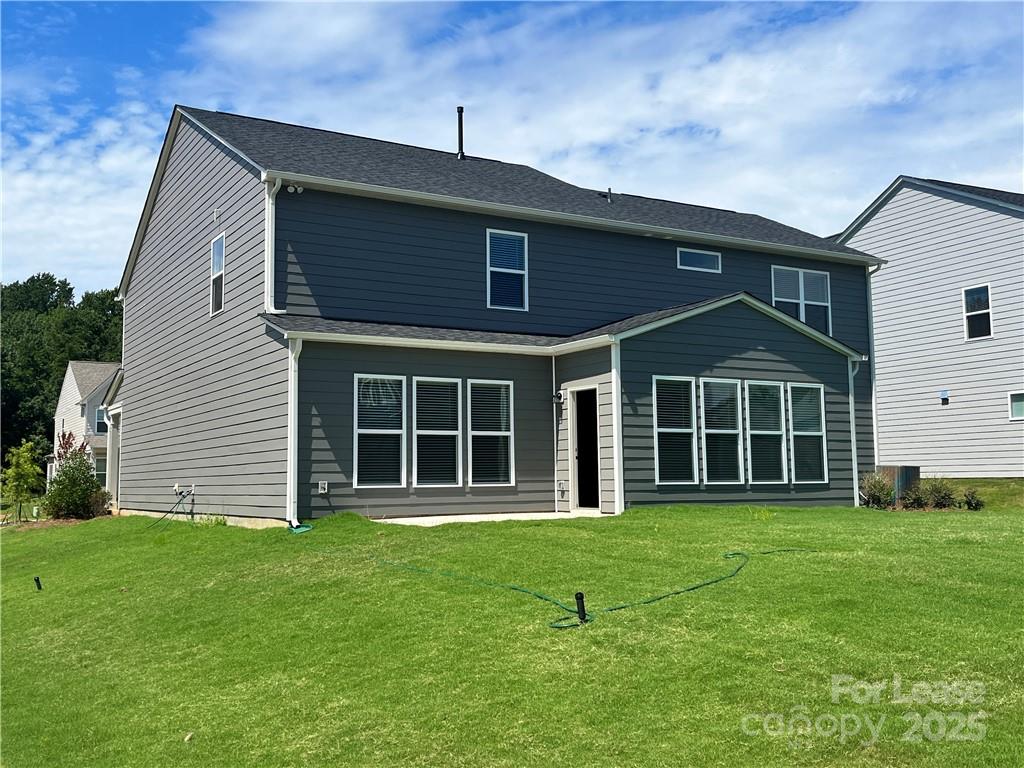 11506 Oakhampton Way Matthews, NC 28105 - Photo 25 of 27 a front view of a house with a yard