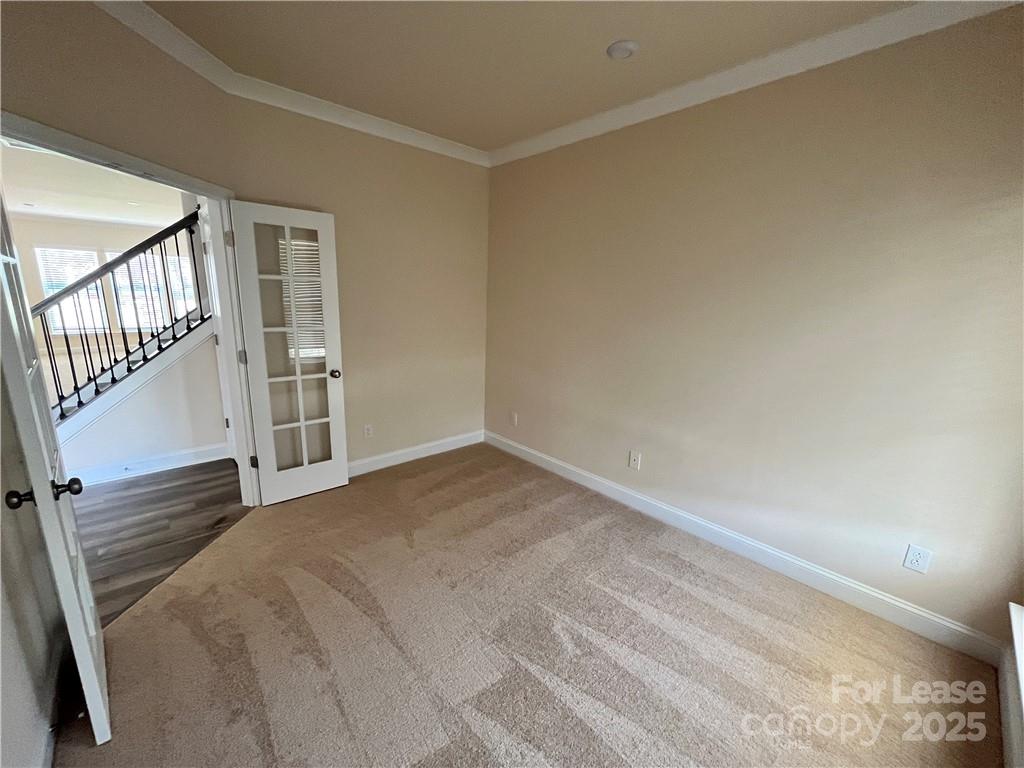 11506 Oakhampton Way Matthews, NC 28105 - Photo 6 of 27 a view of an empty room with a window