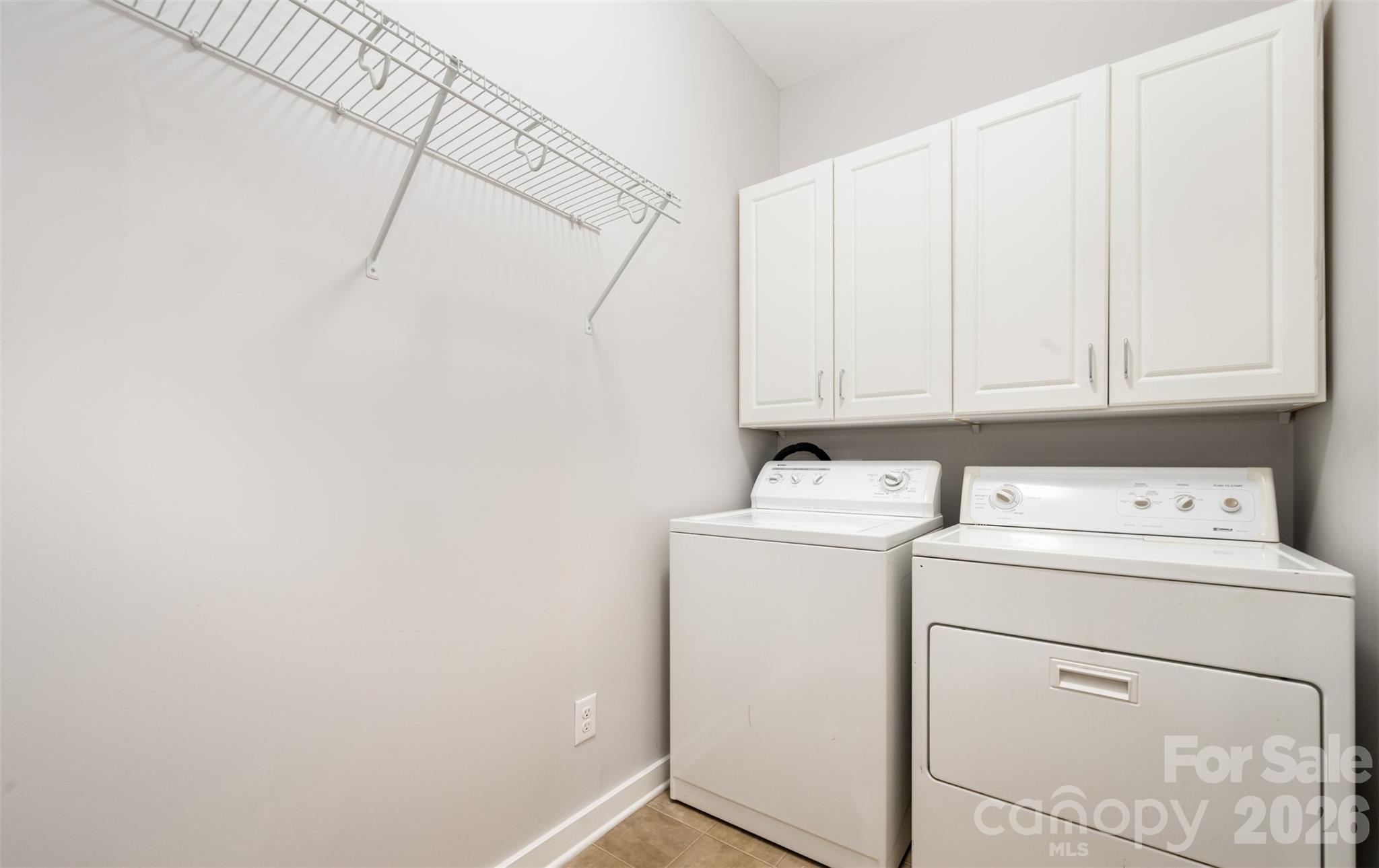 4822 Tradd Circle Monroe, NC 28110 - Photo 11 of 21 a utility room with dryer and washer