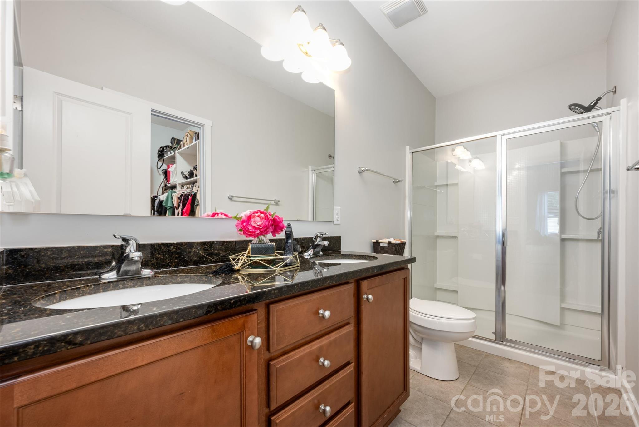 4822 Tradd Circle Monroe, NC 28110 - Photo 14 of 21 a bathroom with a granite countertop sink mirror vanity and toilet