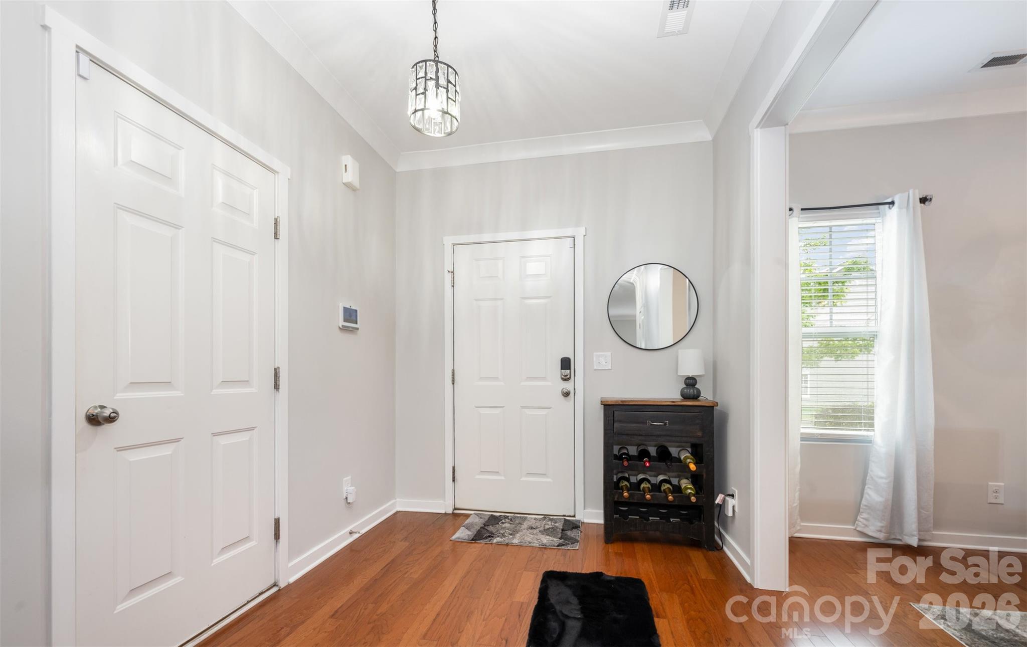 4822 Tradd Circle Monroe, NC 28110 - Photo 4 of 21 a room with wooden floor and white walls