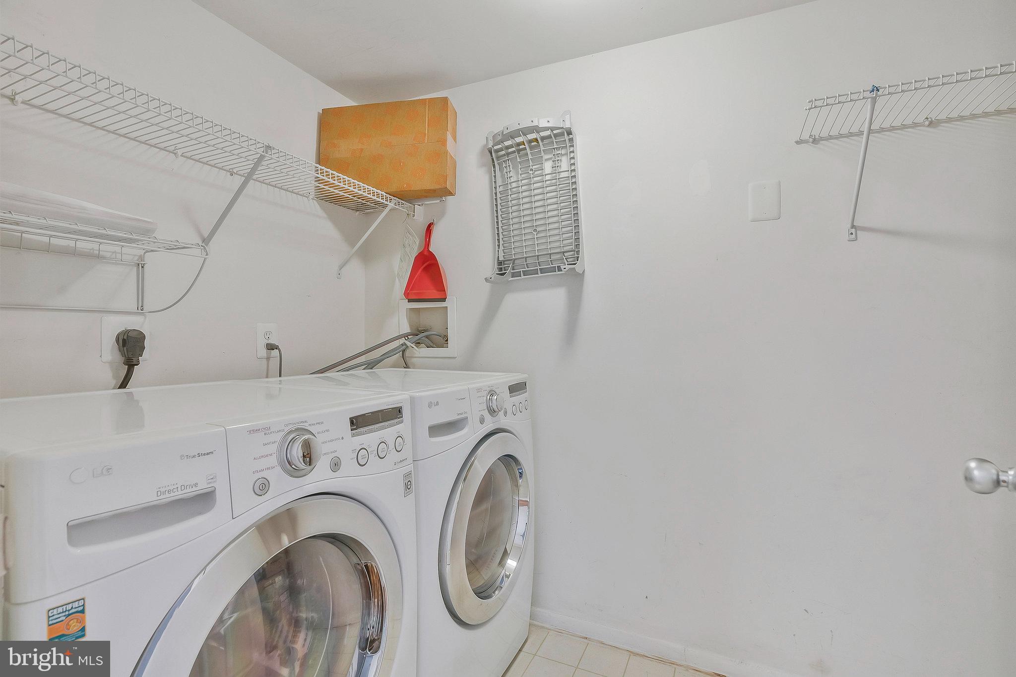 1701 Ascot Way, Unit 1701A Reston, VA 20190 - Photo 23 of 32 a utility room with dryer and washer