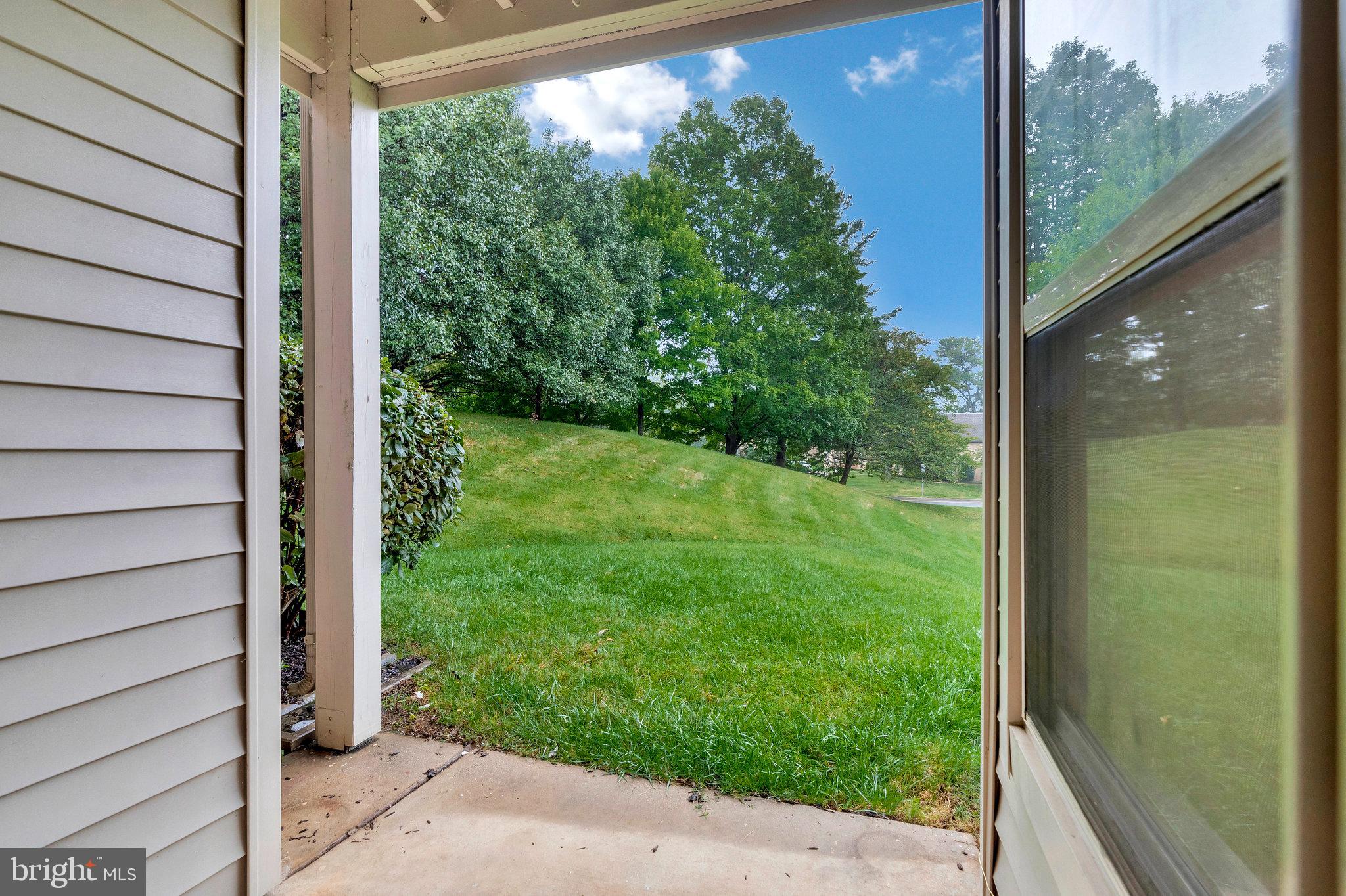 1701 Ascot Way, Unit 1701A Reston, VA 20190 - Photo 30 of 32 a view of a balcony with a tree