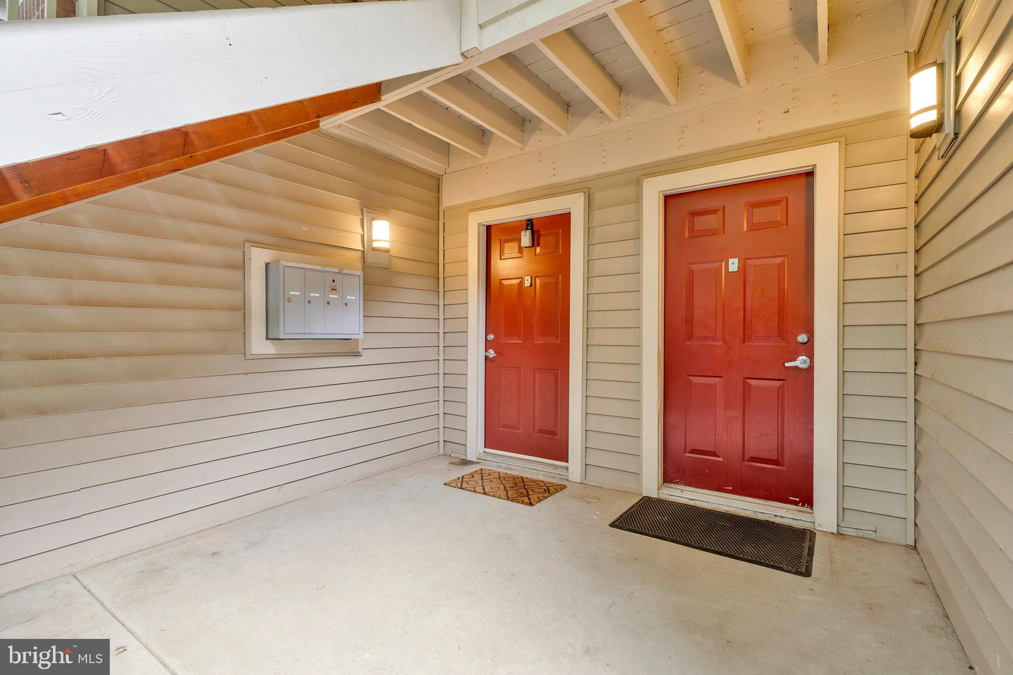 1701 Ascot Way, Unit 1701A Reston, VA 20190 - Photo 4 of 32 a view of front door of a house