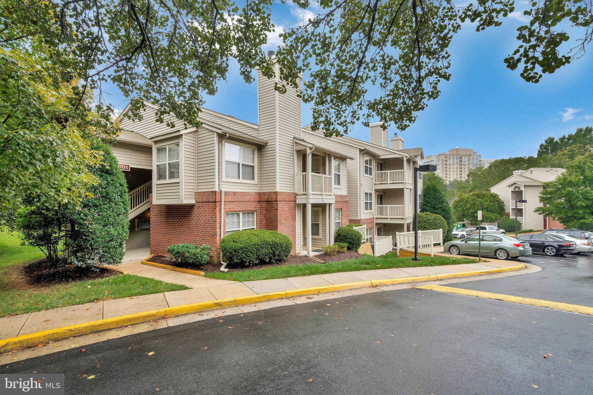 1701 Ascot Way, Unit 1701A Reston, VA 20190 - Photo 5 of 32 a view of a building with a street