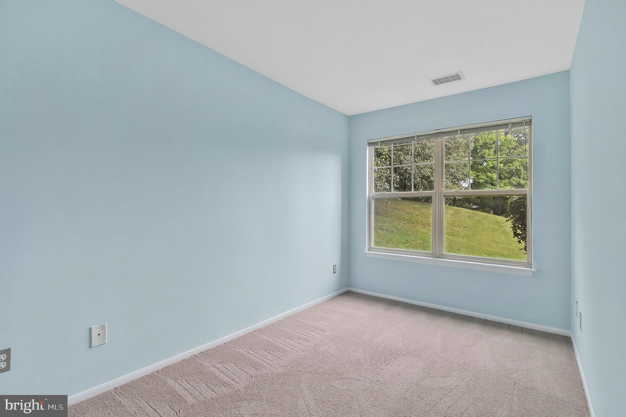 1701 Ascot Way, Unit 1701A Reston, VA 20190 - Photo 8 of 32 an empty room with a window